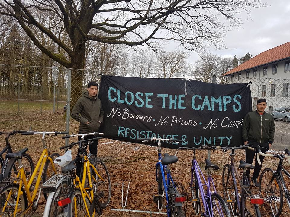 A banner outside Kærshovedgård detention camp in Denmark.